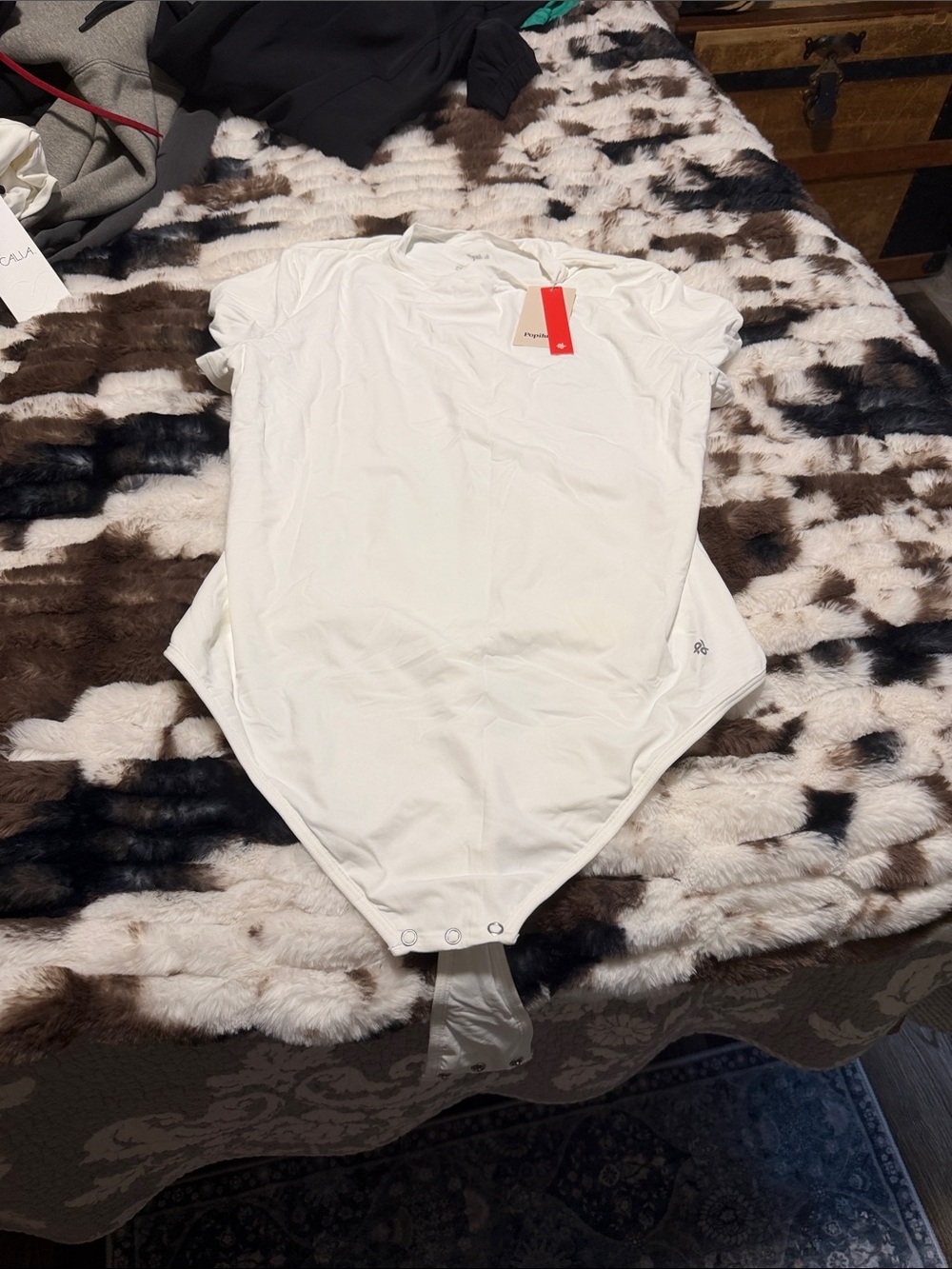 Women's White Short-Sleeve Bodysuit with Snap Closure